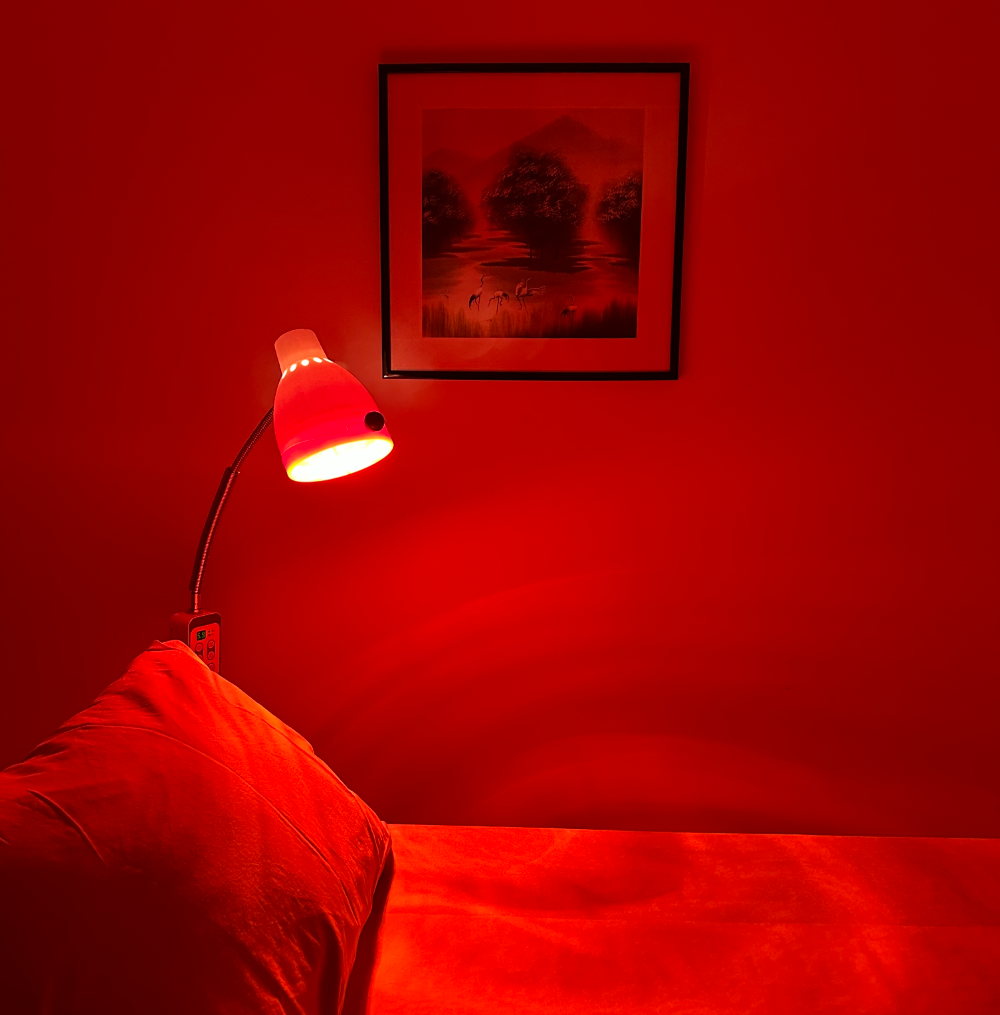 Treatment table under red light lamp